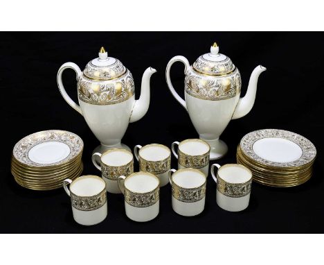 WEDGWOOD; a 'Gold Florentine' twenty-nine piece part coffee service comprising two coffee pots and covers, ten saucers, ten s