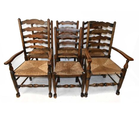 A harlequin set of ten 19th century rush seated ladder back dining chairs (8+2).