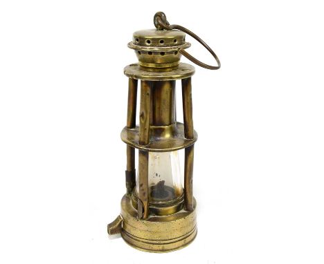 ASHWORTH PATENT; a Hepplewhite grey Stanley of Derby brass miner's lamp of conical form, height 24cm.Condition Report: The gl