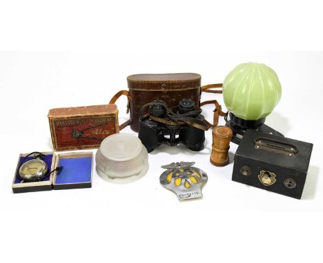 A small quantity of collectors' items to include a treen dice thrower, Brotschneidemaschine cased binoculars, Art Deco bakeli