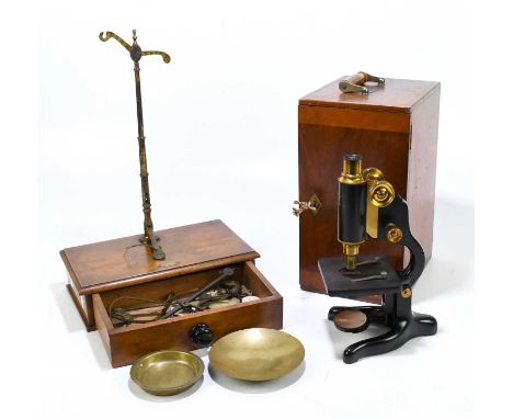 JOHN NESBITT, 42 MARKET STREET, MANCHESTER; a set of late 19th/early 20th century balance scales with single base drawer, tog