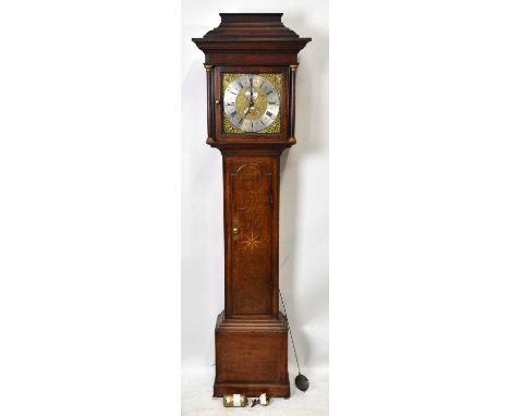 SAMUEL ASHTON, TIDESWELL; an 18th century oak cased thirty hour longcase clock, the hood with eagle finial, above the panel o