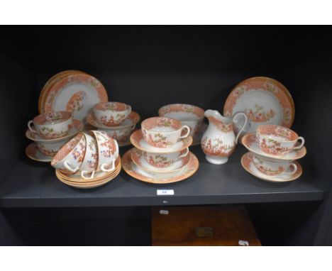 A selection of Victorian hand painted teaware, the design featuring Chinese landscapes with pagodas, including teacups, sauce