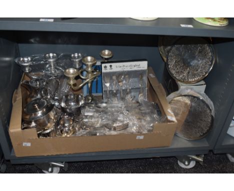 A selection of assorted silver plated ware, to include flatware, candelabras, and teaware