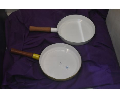 Two vintage Dansk designs France IHQ skillet pans with wooden handles, in vibrant yellow and white both measuring 25cm in dia