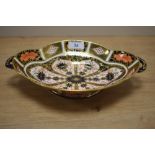 A Royal Crown Derby footed dish, of shaped and oval form and decorated in the Old Imari pattern,