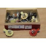 A box of enamelled Christmas tree candle clips
