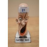 A Shafer & Vater novelty smoker head singer ashtray, measuring 12cm high