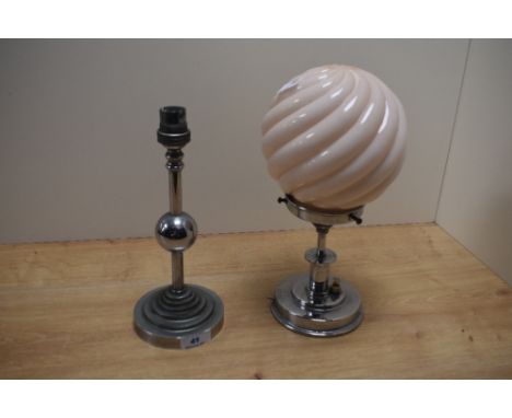 An Art Deco chromed table lamp with pink swirl glass shade, measuring 28cm high, and a separate chromed table lamp base