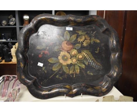 A Victorian Tole Ware tray with painted floral design to centre, 57cm wide. Sold together with a decoratvie planter with gold