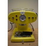 A retro Francis Francis XI Magic L'Espresso coffee machine in yellow with filter