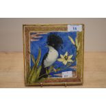 An attractive art tile designed by W.B. Simpson & Sons, illustrated with an exotic crested bird