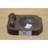 A Robert Thompson of Kilburn Mouseman carved oak ashtray, measuring 10cm long