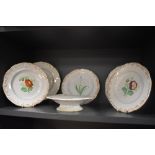 A 19th Century pearlware comport, hand painted with a foliate border and heightened with gilding,