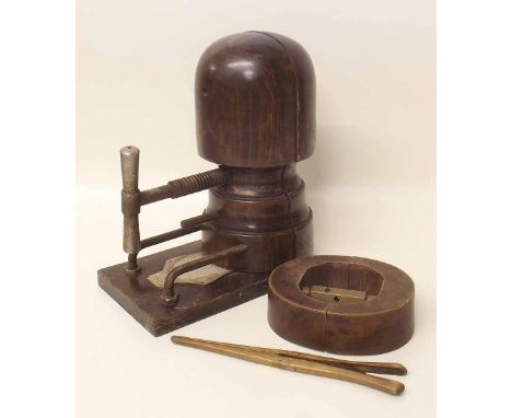 Ideal conformateur hat stretcher dated 1928, one other hat stretcher and a glove stretcher. Condition report: see terms and c