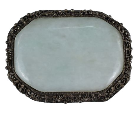 A Chinese early 20th century white metal clip with large flat jade stone insert. Marked China. 42mm x 32mm&nbsp;