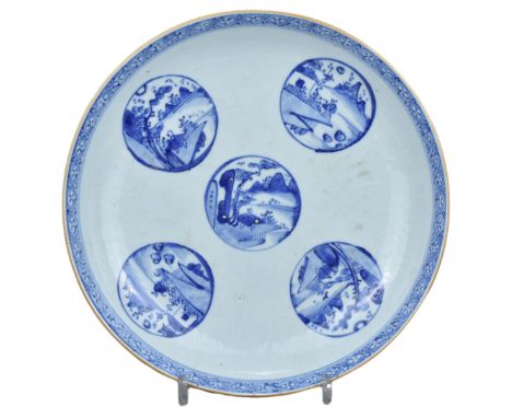 A Large Chinese Kangxi Blue & White Carved Porcelain Dish. The inner surface has been lightly carved with an elaborate lotus 