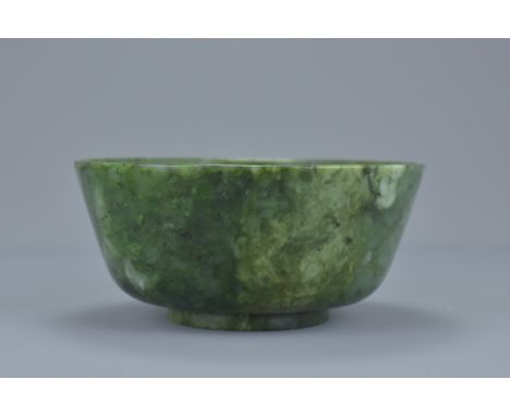 A quality Chinese 18/19th century spinach jade bowl. With a Spink &amp; Son collector label to base. 13.5cm diam.   From an E
