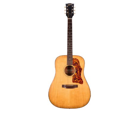 Gibson J-40 acoustic guitar, made in USA, circa 1975; Back and sides: mahogany, light marks and scratches to the back; Top: n