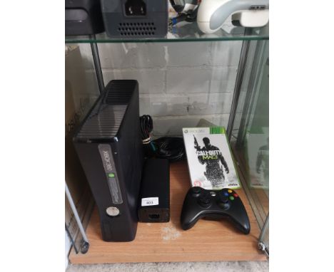 Xbox 360 slimline  console with controller and game. 