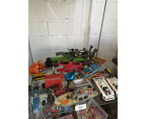 Shelf of playworn vehicles etc. 