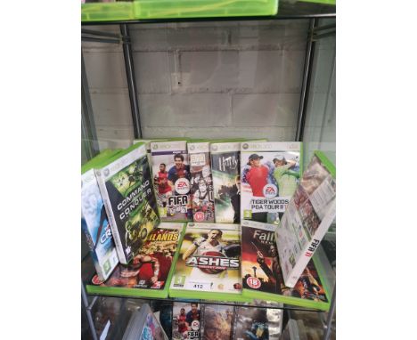 Shelf of xbox 360 games. 