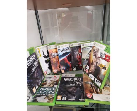 Shelf of xbox 360 games. 