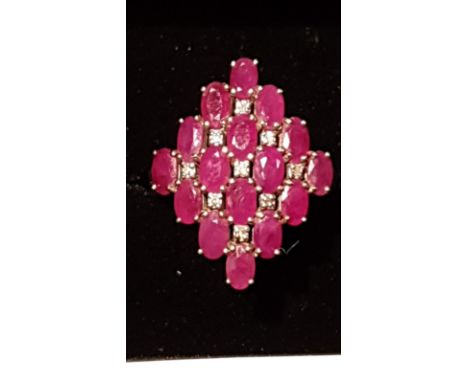Absolutely Fantastic Diamond And Red Stone Ring Possibly Rubies No mark Tested on Shank 9ct or higher . 
