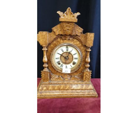 Ansonia of New York light oak mantle clock dated 1882 with pendulum. 