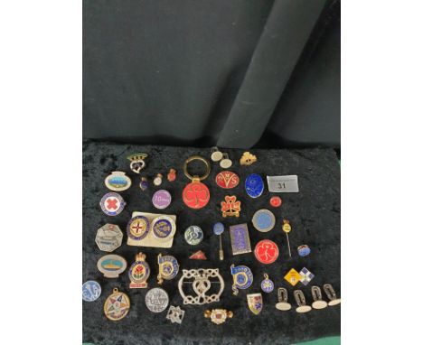 Selection  of enamel badges etc . 