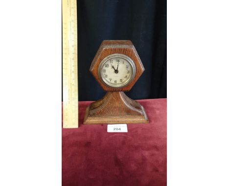 1900s Oak 8 day travel mantle small clock on oak based support. 