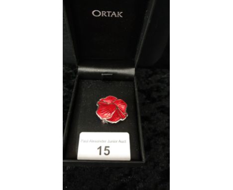 Ortak silver and enamel flower brooch . 