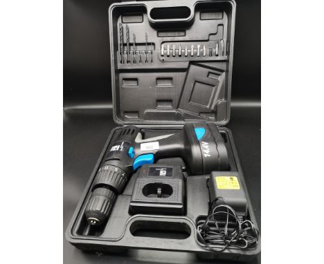 Boxed PB power drill with bits. 