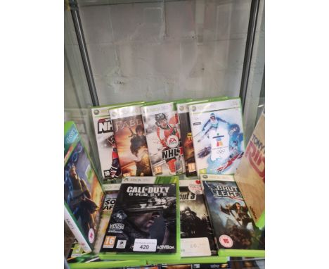 Shelf of xbox 360 games. 