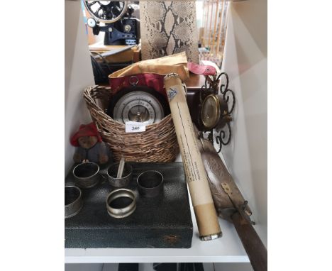 Shelf of collectables includes barometer s. 