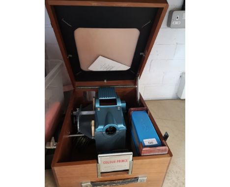 Vintage colour Prince projector in original case. 