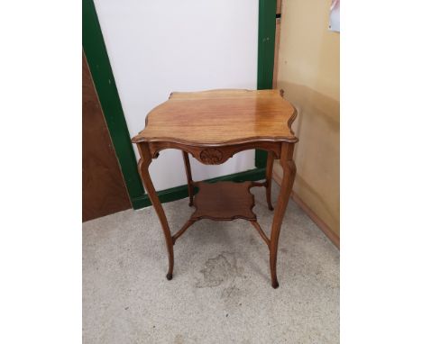 Light 1900s 2 tier window table. 