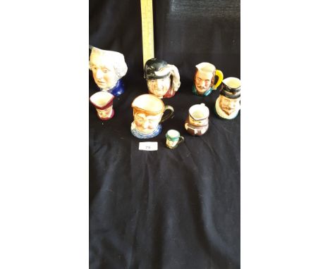 Lot of royal doulton small Toby jugs, hummel monk jug etc. 
