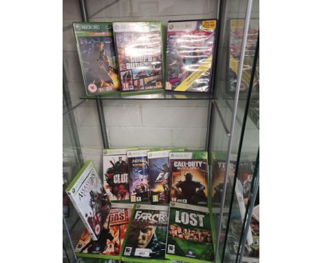 Shelf of xbox 360 games. 