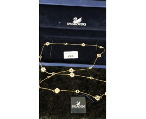 Large Swarovski crystal and enamel necklace with box . 30 inch length chain boxed . 