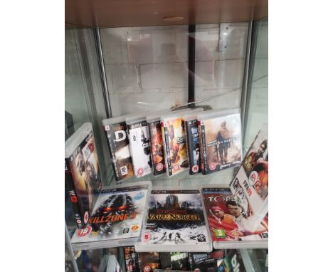 Shelf Of PlayStation 3 games. 