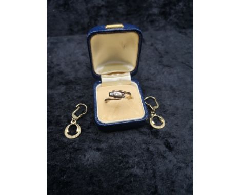 Pair of 9ct gold earrings together with 9ct gold gold hall marked ring with diamonds one stone missing. 2 stones  Testing as 