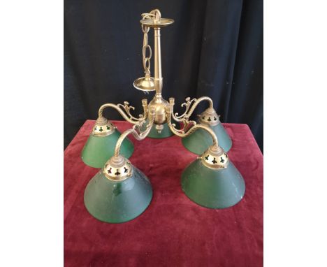 Retro brass ceiling light with green shading. 