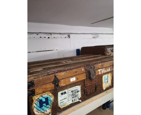 1900s wooden  bound trunk with interior design 