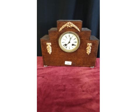1900s mantle clock with enamel face with pendulum. 