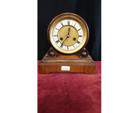 Victorian Barrell Shaped clock with pendulum with enamel clock face. 