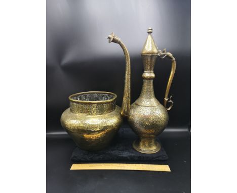 Large Arabic brass planter 8.5 inches in height  together with large heavy ornate eastern tea pot stands 17 inches in height.