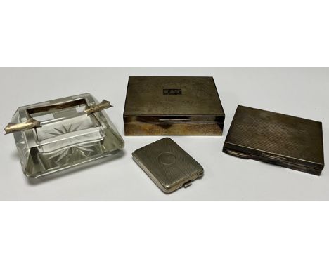 An Elizabeth II silver engine turned cigarette box, hinged cover with monogram, cedar wood lined, 10.5cm wide, Birmingham 195