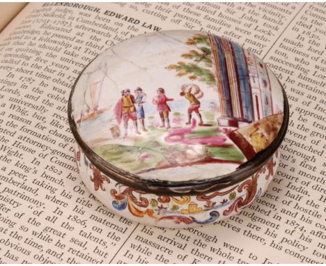 A George III South Staffordshire enamel circular table snuff box, hinged cover painted with figures at an Italianate harbour,