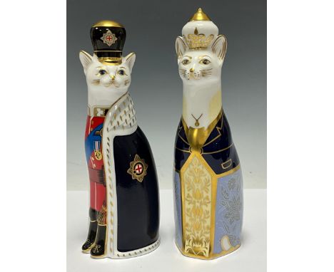 A pair of Royal Crown Derby paperweights, Royal Cat William and Royal Cat Catherine, celebrating the birth of the first child